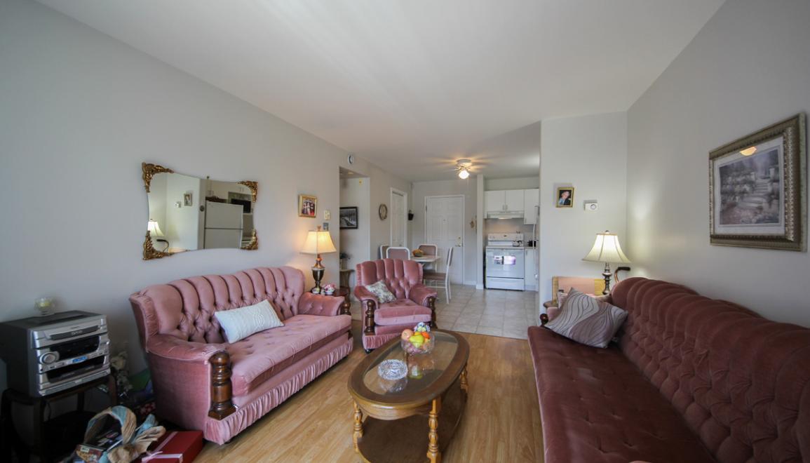 360 Acadie Avenue Apartments Living Room & Kitchen Image