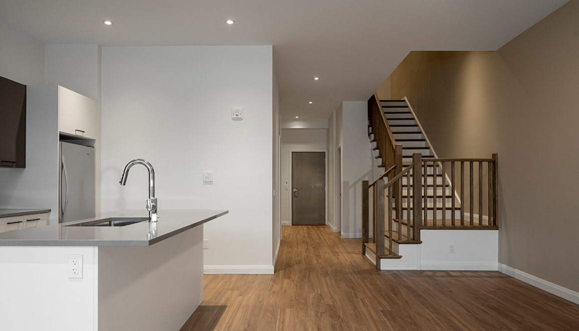 The Carrick Townhome Kitchen & Living Room Stairs