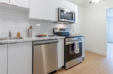 Woodhaven Renovated Kitchen With Views of Living Room